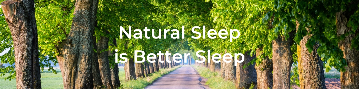 Natural Sleep is Better Sleep in white font overlaying a scenic pathway lined by large tree
